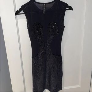 Brian Lichtenburg dress seen on many celebrities sparkle. Size medium 4-6